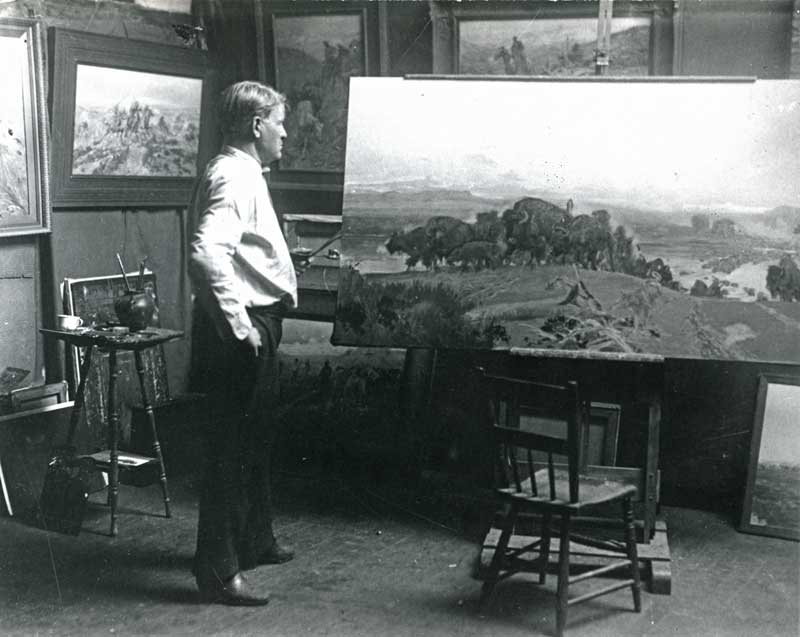 Russell at His Easel with “When the Land Belonged to God,” 