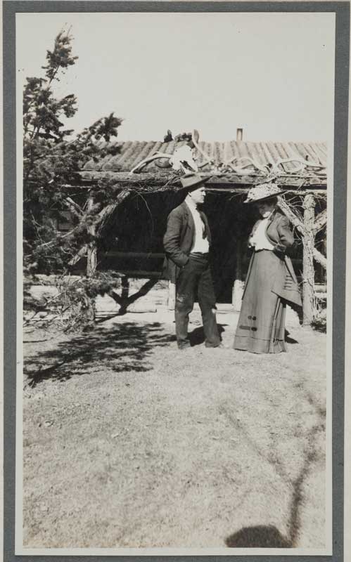 Charles M. Russell and Nancy C. Russell in Front of Studio, c. 1903-1910. Silver gelatin print, 6.375 x 4 in. Gilcrease Museum, Tulsa, OK (TU2009.39.271.10a-b)